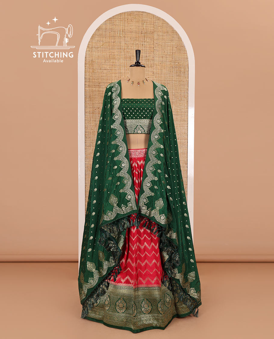 Tomato red chiniya crepe half-saree, chevron zari jacquard with contrast intricate patterned stone work bordered skirt, contrast blouse, and a scallop bordered intricate dhavani