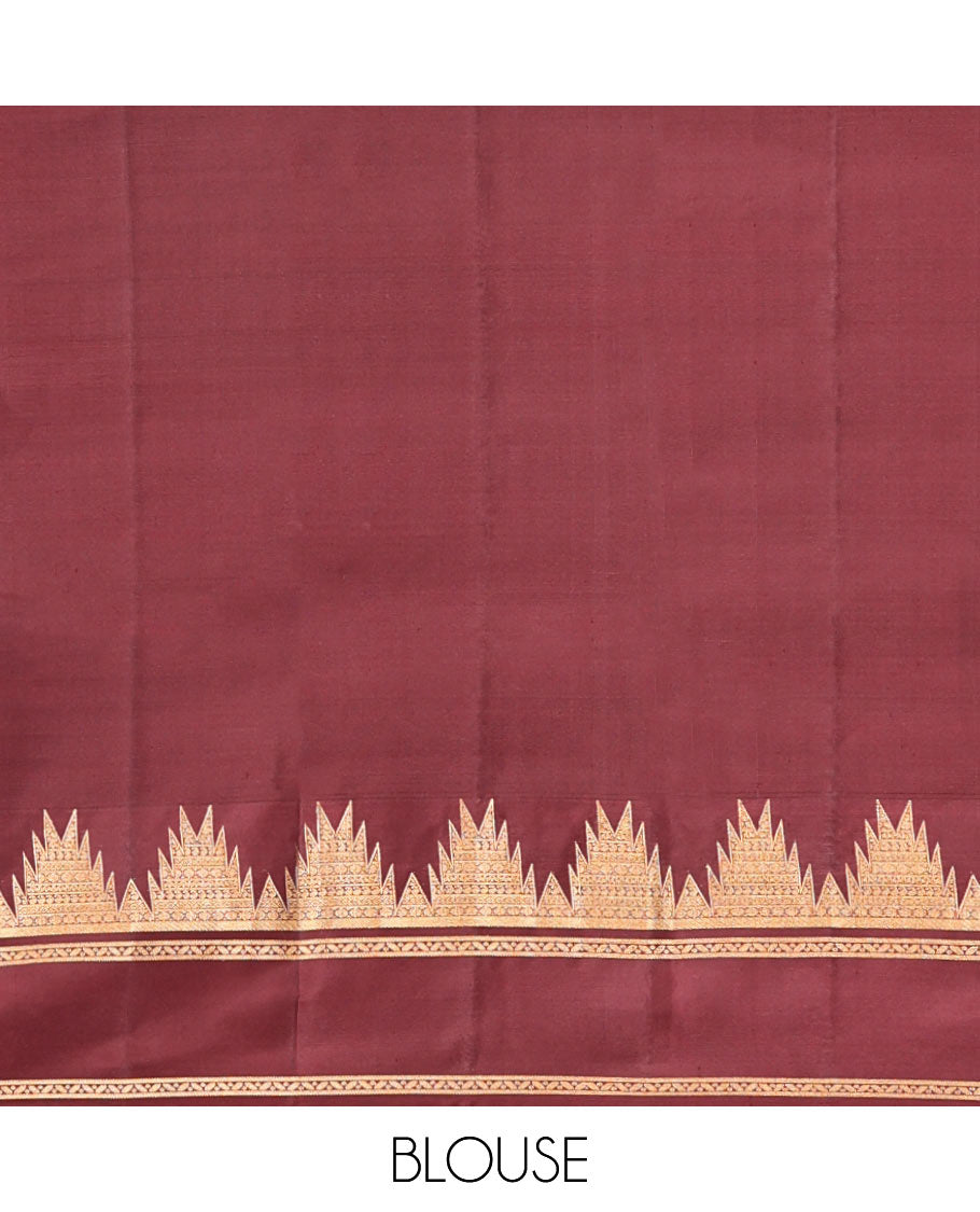 Orange Vasundhara Silk Saree, Delicately Woven with Zari Buttas, Complemented by a Contrast Rettai Pettu Border of Thazampoo Rekku Designs, Vanki Pallu, and a Contrast Blouse