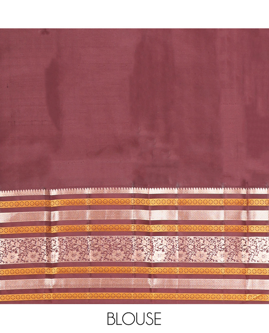 Pink Vasundhara Silk Saree, Embellished with Mayil and Chakram Buttas All Over Its Body, Complemented by a Contrast Border of Thilakam, Neli, Laddu Kamalam, and Kodi Visiry Designs, Grand Pallu of Butta Enclosed Checks, and Paired with a Contrast Blouse
