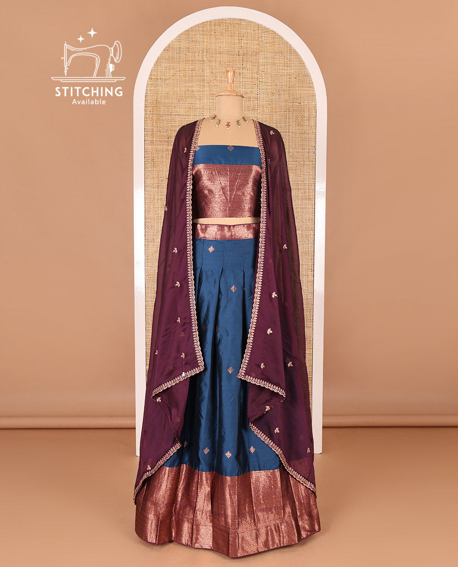 Peacock blue taffeta silk half-saree, zari buttas and contrast traditional zari bordered skirt, a matching taffeta silk blouse, and contrast embroidered satin georgette  dhavani