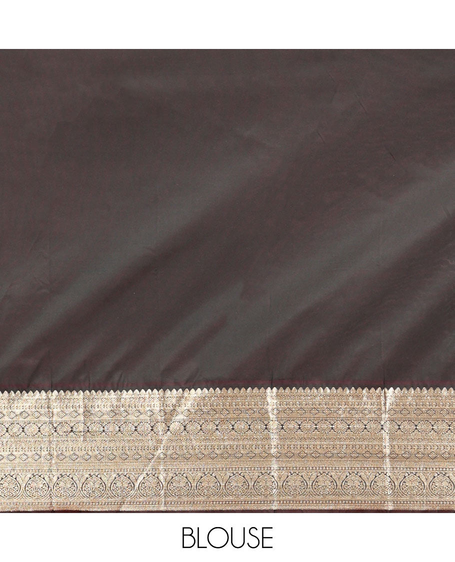 Reddish Orange Budget Silk Saree, Elevated with Floral Zari Buttas All Over Its Body, Complemented by Contrast Traditional Zari Designs Woven Big Border, Grandly Decked Up Pallu, and Paired with a Contrast Blouse