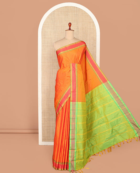 Orange Aarani Silk Saree, Subtly Enriched with Checked Design on Its Body, Complemented by a Contrast Border, Pallu of Stripes, and Paired with a Contrast Blouse