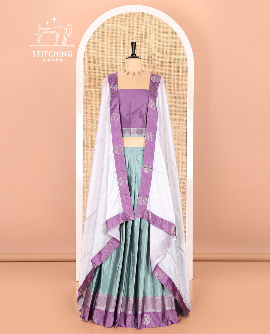 Steel grey and lavender half-saree with buttas with contrast traditional bordered taffeta silk skirt, a matching blouse, and a contrast bordered syska georgette dhavani