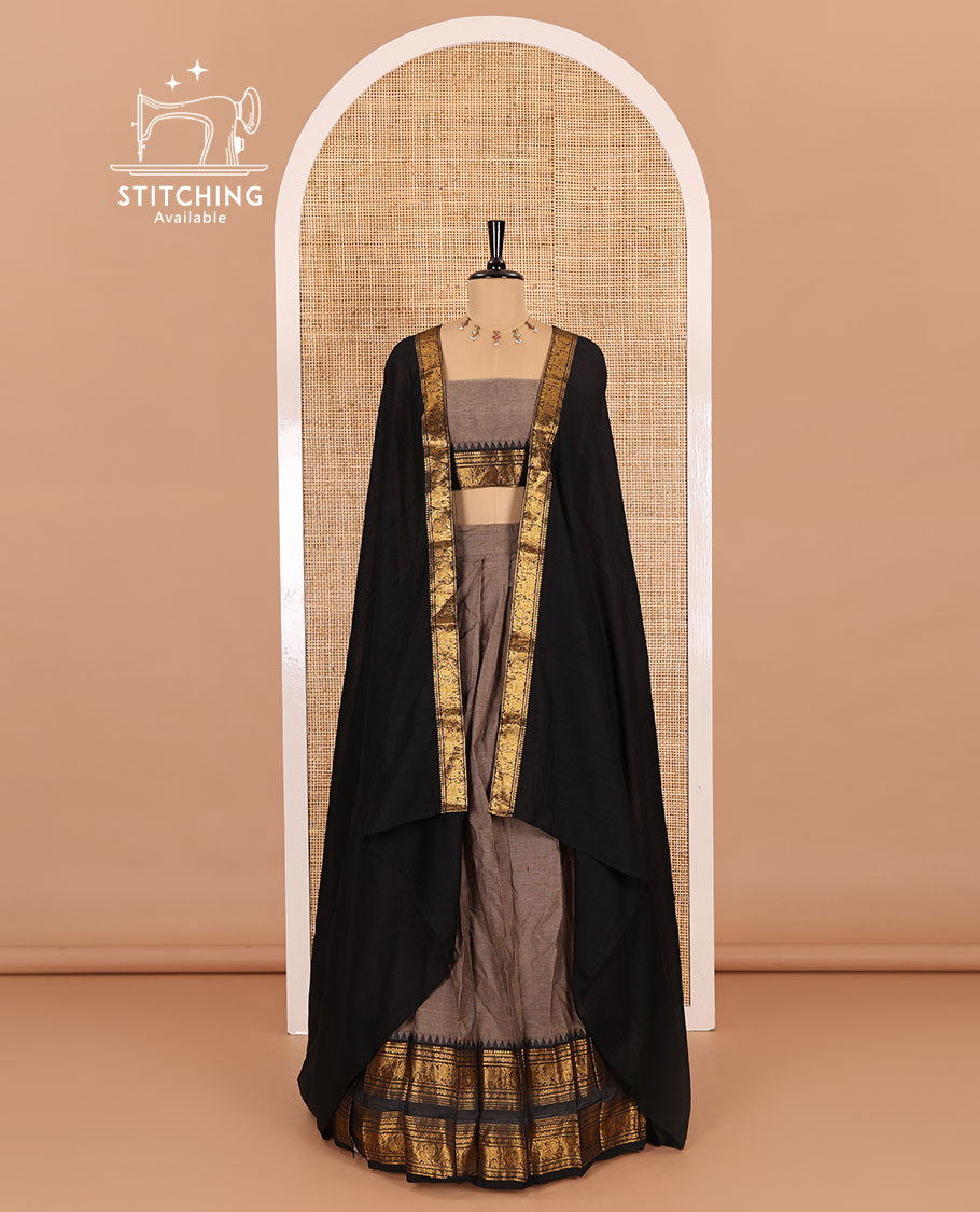 Grey-black sungudi cotton half-saree, plain with contrast traditional zari varisai pettu bordered skirt, a matching blouse, and a zari bordered dhavani