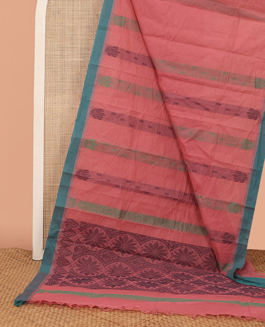 Pink Kanchi Cotton Saree Adorned with Floral-Theme Buttas All Over Its Body, Complemented by a Contrast Border, Pallu Features Flower-Enclosed Circle Patterns, and Paired with a Matching Blouse