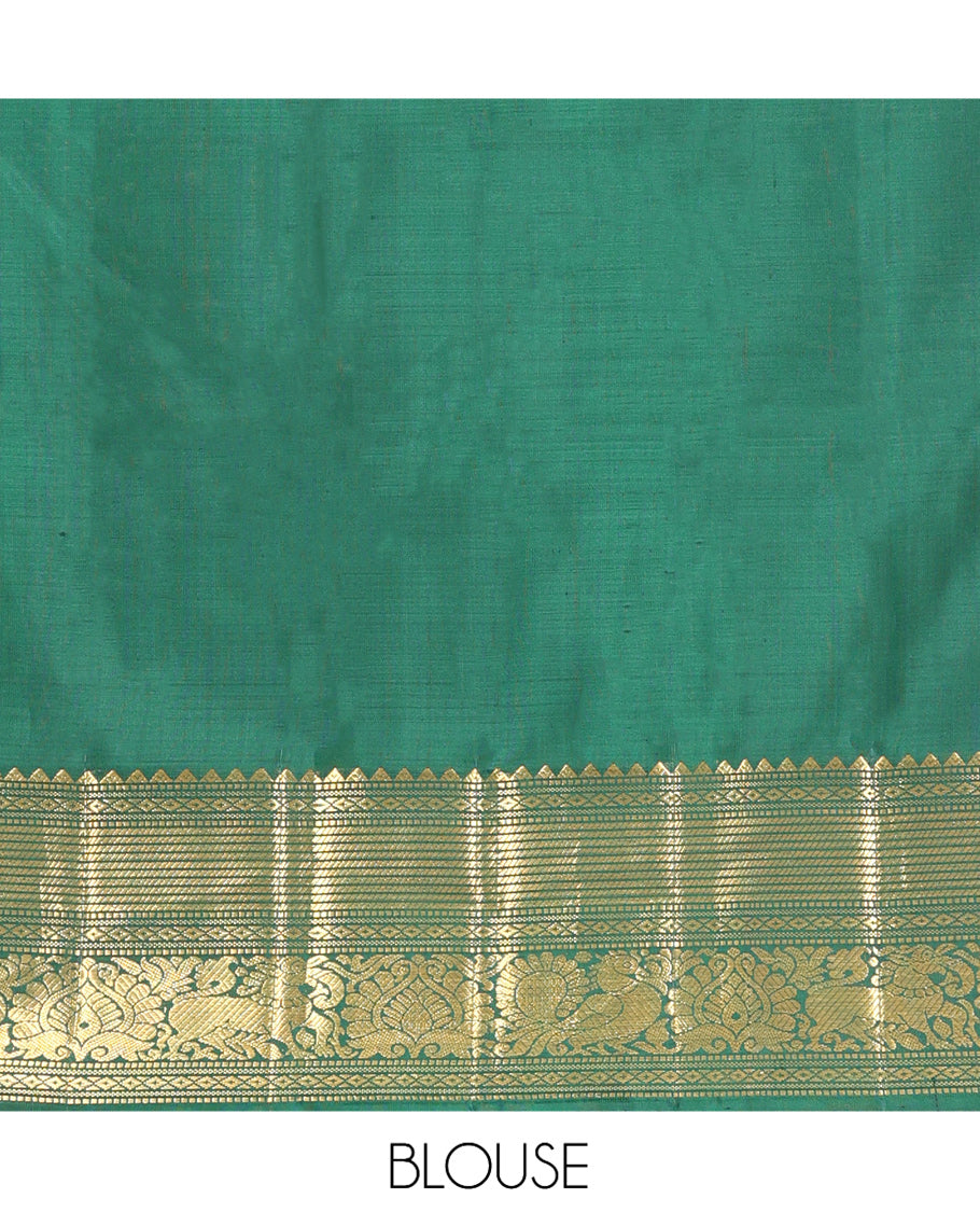 Green Kanchipuram Silk Saree, Elevated with Mayil-Chakram Buttas, a Zari Border of Rekku, Muthu, Mayil Kann, Banaras, Mayil, and Yaali Designs, Jaal Pallu, and a Matching Blouse
