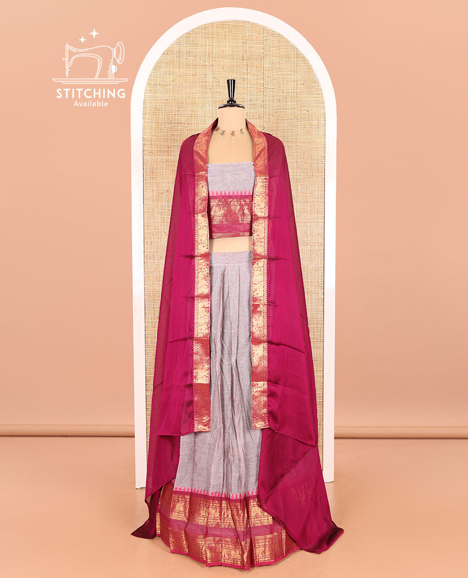 Steel Grey-Rani Pink Chettinad Cotton Half-Saree Featuring a Plain Skirt, Highlighted with a Contrast Peacock-Elephant Motifs Woven Rettai Pettu Zari Border, a Subtly Woven Matching Blouse, and a Vichitra Silk Contrast Traditional Zari-Bordered Dhavani