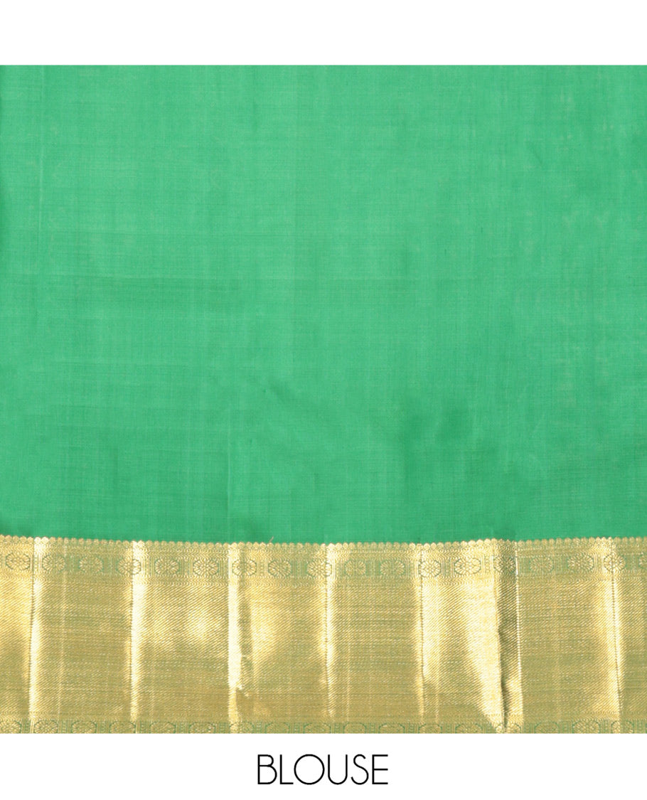 Red Parampara Silk Saree, Embellished with Zari Buttas, a Zari Border of Thilakam Mokku, Muthu, Kathir, and Chakram Designs, Intricate Pallu, and a Matching Blouse