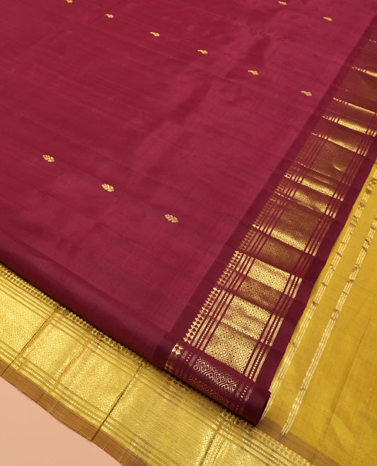 Maroon Kanchipuram Silk Saree, Graced with Zari Buttas, Highlighted by a One-Sided Zari Border of Panner Sombu, Banaras, Muthu, and Jaal Designs, Contrast Grand Pallu, and a No Blouse