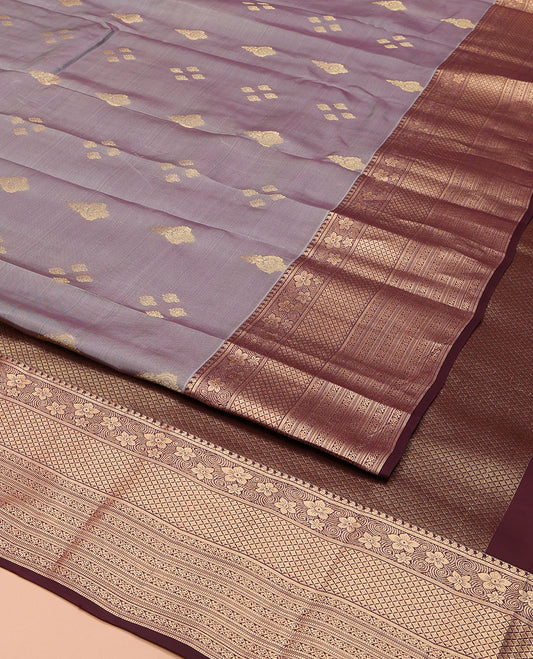 Grey Vasundhara Lite Silk Mix Saree, Elevated with a Zari Buttas on Its Body, Complemented by a Contrast Border of Manga, Jaal, Muthu, and Kodi Visiry Designs, Pallu of Jaal Designs, and Paired with a Contrast Blouse