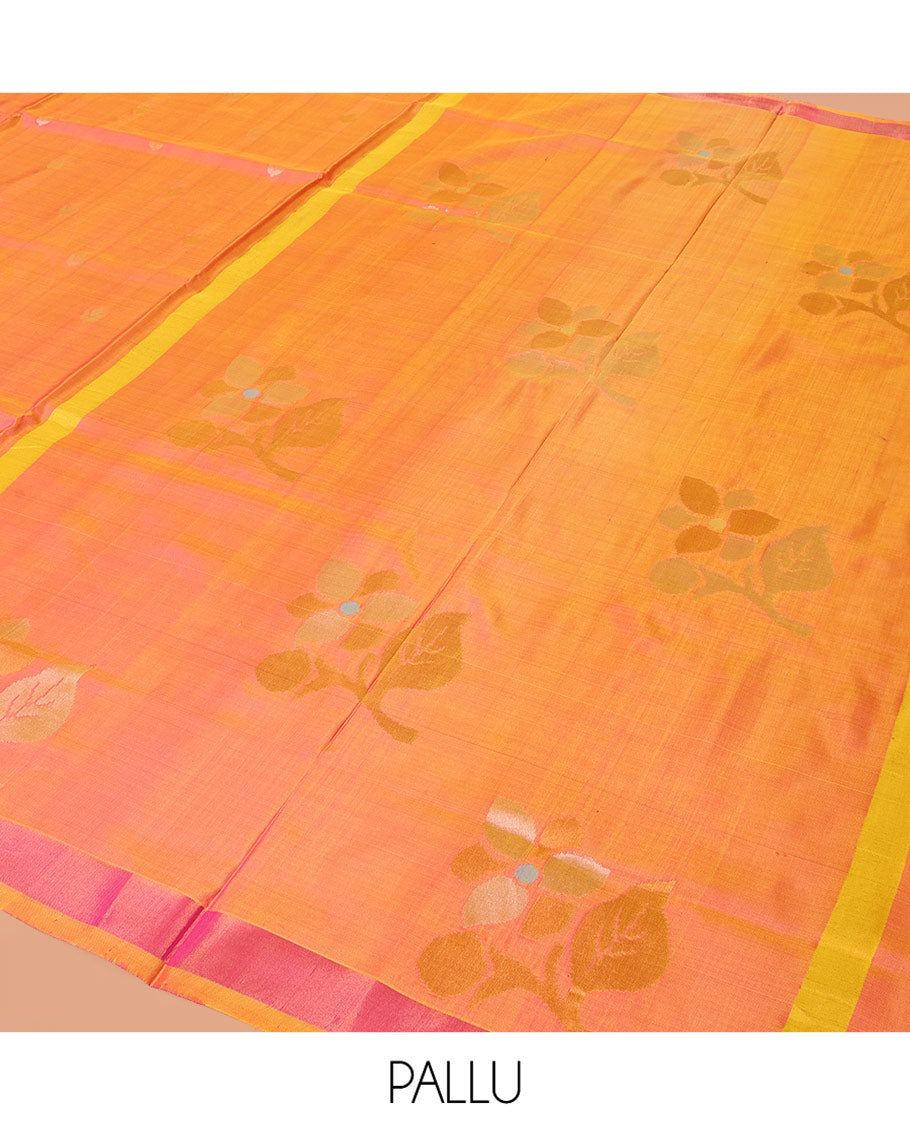 Orange Uppada Silk Saree Decorated with Zari Buttas, Complemented by Bavanji Border, Pallu Depicting Floral Motifs, and Paired with a Matching Blouse