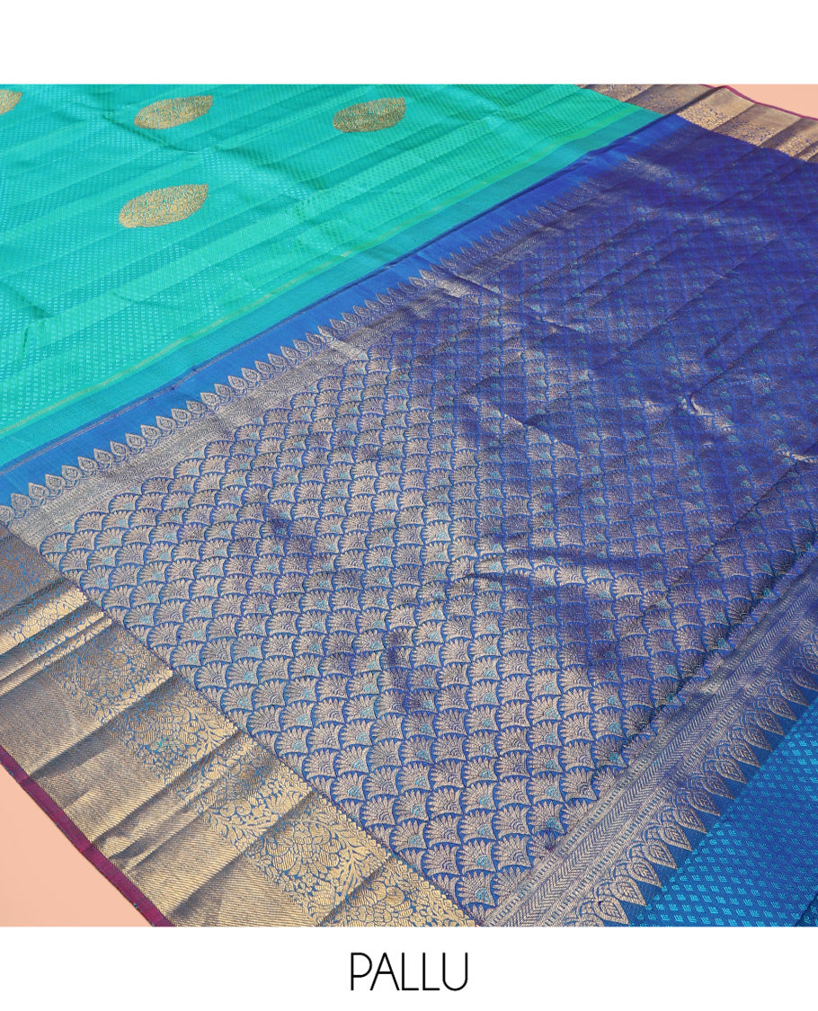 Blue Embossed Parambara Silk Saree, Elevated with Zari Buttas, a Contrast Border of Kodi Visiry Designs, Pallu of Scallop Design, and Contrast Blouse