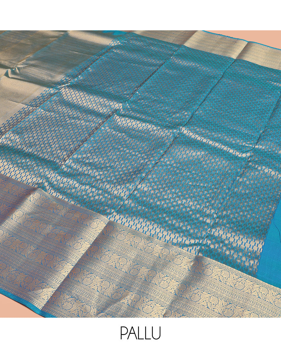 Scintillating Blue Vasundhara Lite-Silk Mix Saree, Gleamed Up with Zari on Its Body, Highlighted by Thazampoo Rekku Border of Neli, Paisa, Cross Kamalam, and Kodi Visiry Designs, a Grand Geometric-Patterned Pallu, and Paired with a Matching Blouse