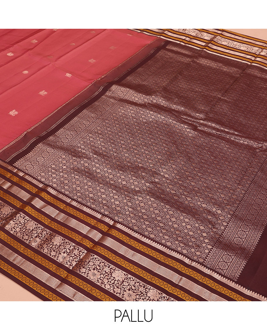 Pink Vasundhara Silk Saree, Embellished with Mayil and Chakram Buttas All Over Its Body, Complemented by a Contrast Border of Thilakam, Neli, Laddu Kamalam, and Kodi Visiry Designs, Grand Pallu of Butta Enclosed Checks, and Paired with a Contrast Blouse
