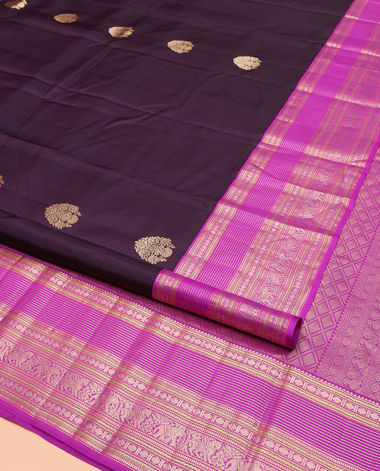 Eggplant Purple Kanchipuram Silk Saree, Adorned with Zari Buttas on Its Body, Complemented by a Contrast Border of Rekku, Neli, Paisa, Muthu, Banaras, Kuthirai, and Yaanai Designs, Grand Jaal Pallu, and Paired with a Contrast Blouse