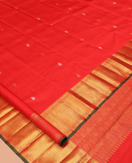 Red Parampara Silk Saree, Embellished with Zari Buttas, a Zari Border of Thilakam Mokku, Muthu, Kathir, and Chakram Designs, Intricate Pallu, and a Matching Blouse