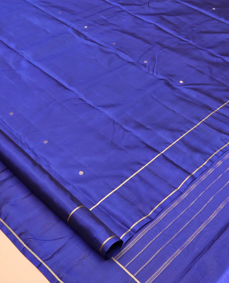Navy Blue Vasundhara Lite Silk Saree, Subtly Sparkled with Paisa Zari Buttas Across Its Body, Highlighted Zari Border of Horizontal Stripes, Gleaming Pallu of Seppu Rekku Designs, and Paired with a Matching Blouse