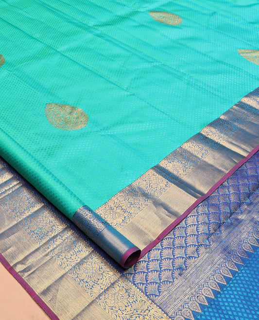 Blue Embossed Parambara Silk Saree, Elevated with Zari Buttas, a Contrast Border of Kodi Visiry Designs, Pallu of Scallop Design, and Contrast Blouse