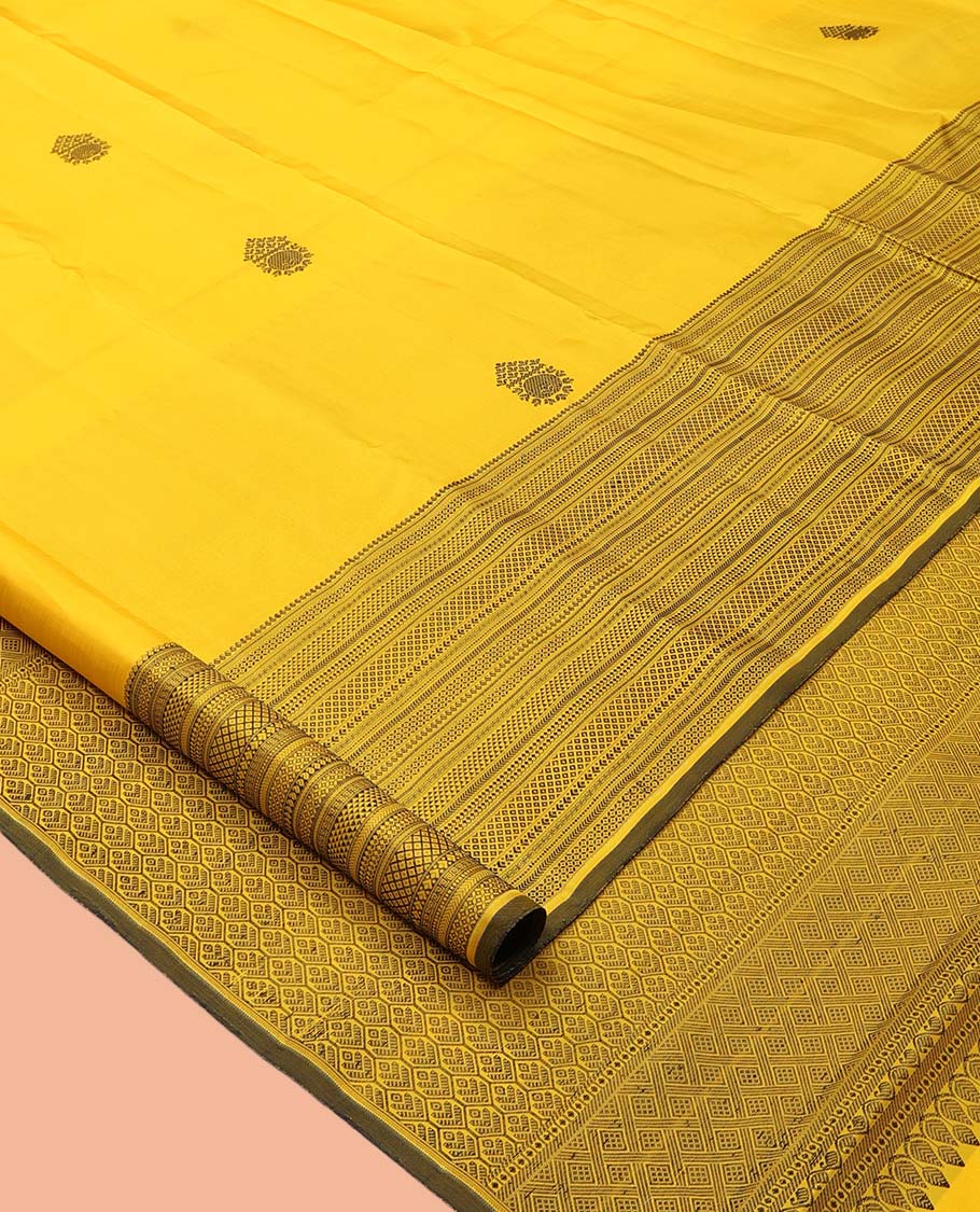 Yellow Kanchipuram Silk Saree, Crafted with Thread Buttas, a Self-Border of Manga, Ara Maadam, Kathir, Mayil Kann, Jaal Pallu, and a Matching Blouse