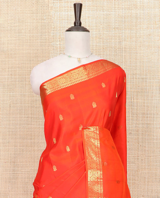 Orange Gadwal Saree Accentuated with Zari Buttas, Traditional Zari Design Border, Pallu Complemented with Multi-Coloured Checks, and a Contrast Blouse