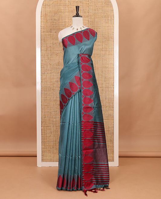 Green plain jute cotton saree , contrast leaf thread butta border & lining seer pallu with tussels