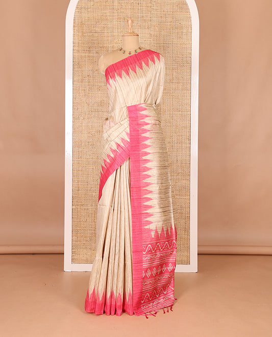Chikku-pink plain Khicha katan silk saree, contrast pink temple border, ikkat printed pallu with tassels, and a contrast blouse
