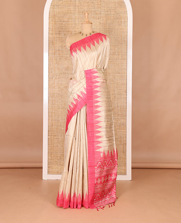 Chikku-pink plain Khicha katan silk saree, contrast pink temple border, ikkat printed pallu with tassels, and a contrast blouse