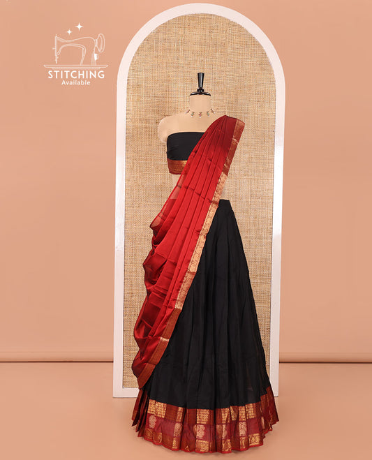 Black Chettinad Cotton Half-Saree Featuring Plain Skirt, Complemented by Contrast Traditional Border of Peacock and Rudraksha Designs, Paired with a Matching Blouse, and a Satin Georgette Zari Bordered Dhavani