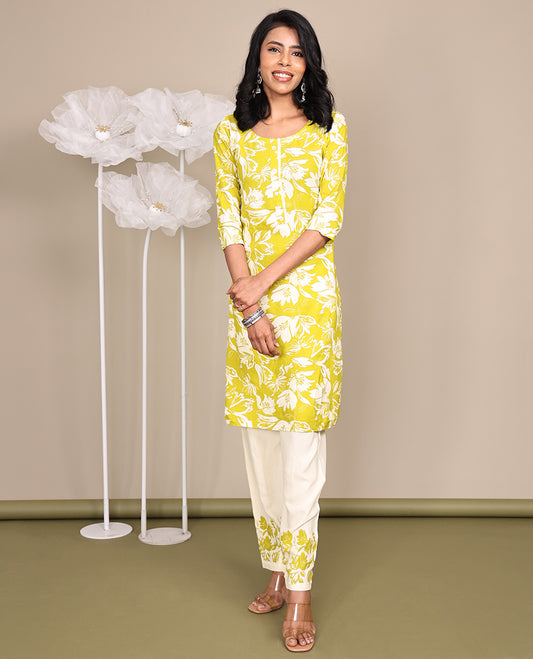 Green Cotton Ready-Made Suit, Featuring Silhouette-Style Floral Prints, a Round Neckline, 3/4 Sleeves, and Straight-Cut Top, Paired with Floral-Printed Straight-Cut Pants