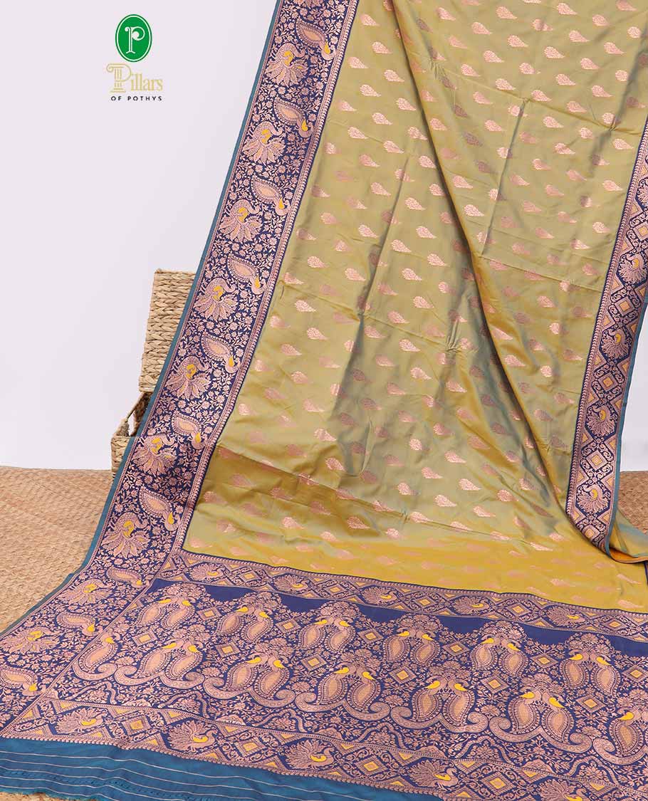 Green Zari buttas malbari soft silk saree with contrast meena border & meena buttas pallu