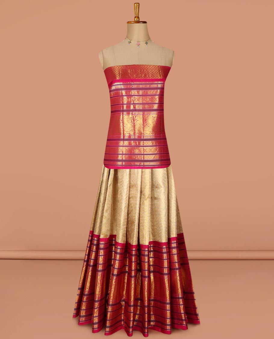 Gold striped silk half saree with contrast border of rekku, banaras, muthu, poo chakram, mayil design, zari design blouse & floral design dhavani