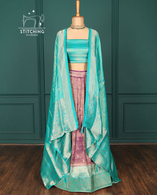 Purple jacquard art-silk half-saree, contrast traditional zari design border, stonework blouse & intricate dupatta