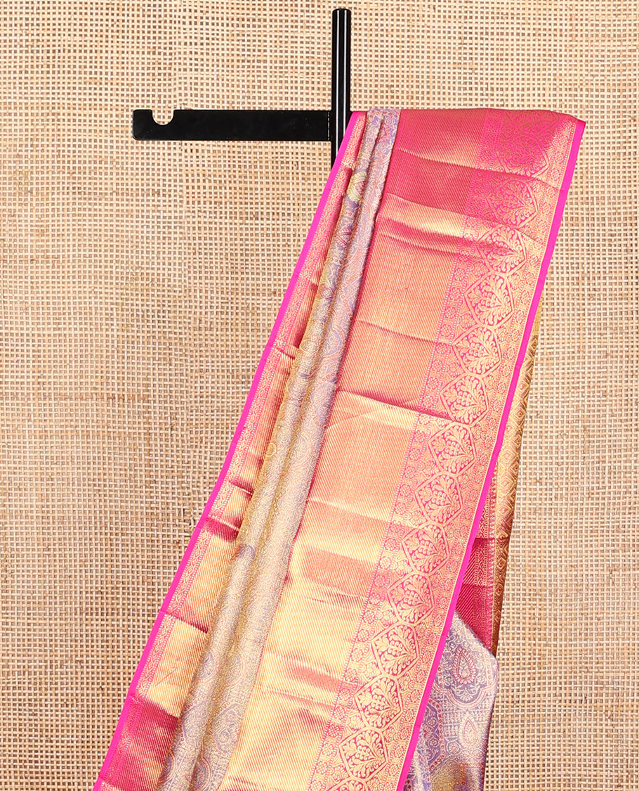 Gleaming lavender zari jacquard Kanchipuram tissue silk saree, contrast border of thilakam, kathir, muthu, kaddu kamalam, and Mughal-style floral bouquets, and jaal pallu