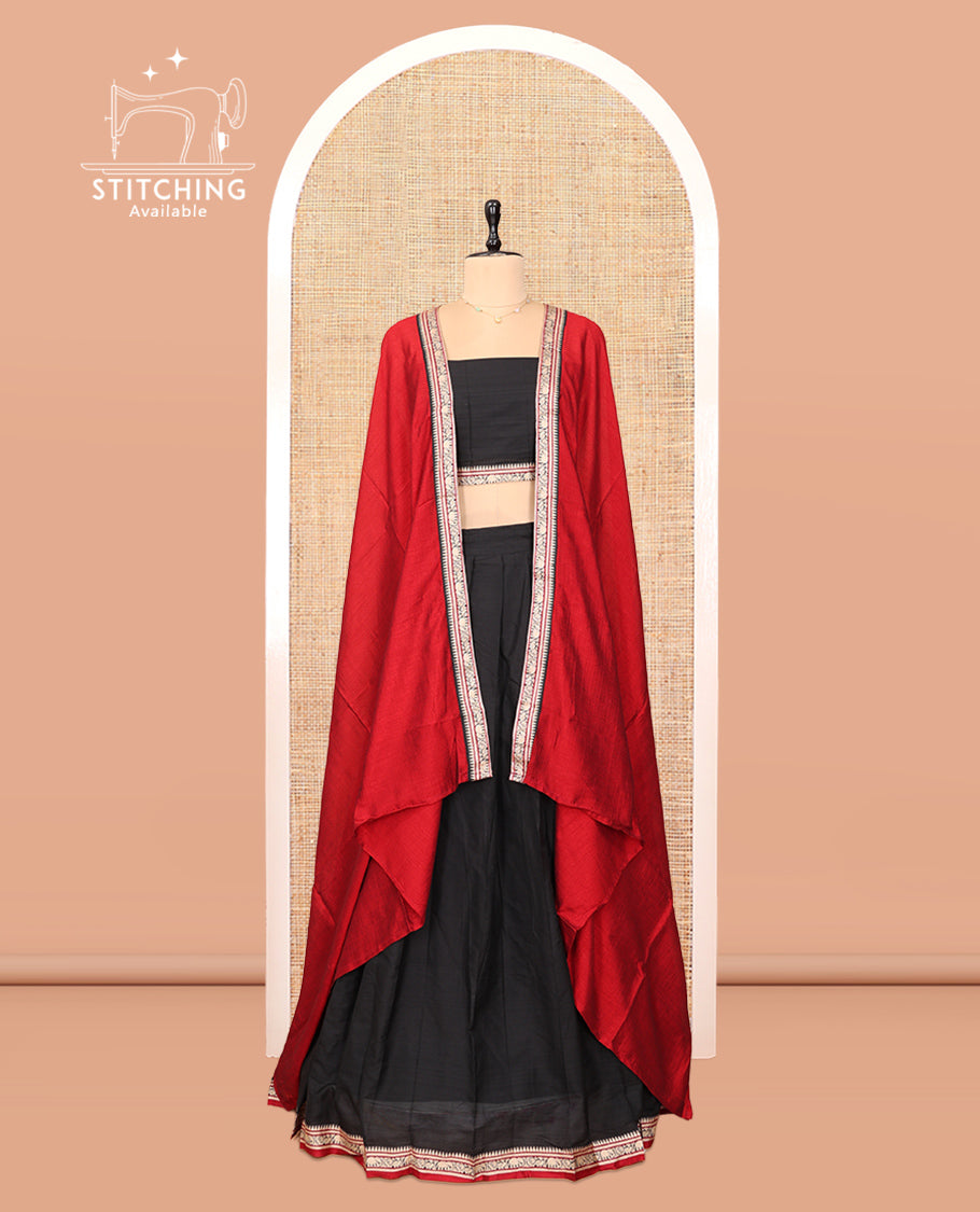 Black Cotton Half-Saree Features Plain Skirt, a Contrast Traditional Border, a Matching Blouse, and a Contrast Dhavani