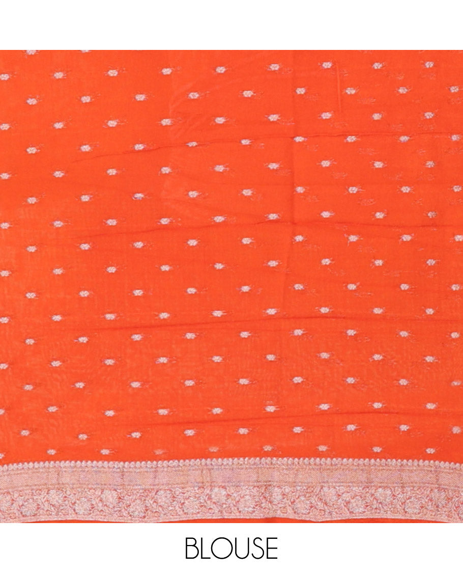 Orange Georgette Saree, Steeped with Buttas, Highlighted by a Traditional Floral Creeper Border, Intricately Designed Pallu, and  a Matching Blouse