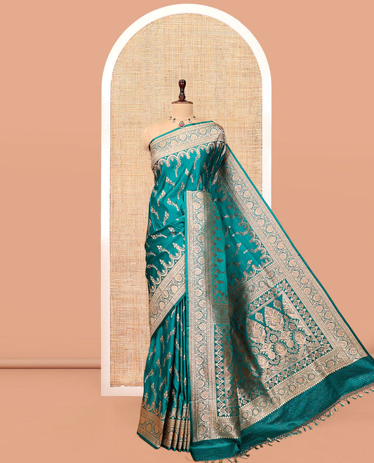 Green Banarasi Satin Saree, Detailed with Floral Buttas, a Floral Creeper Border, Intricate Stonework Pallu, and a Matching Blouse