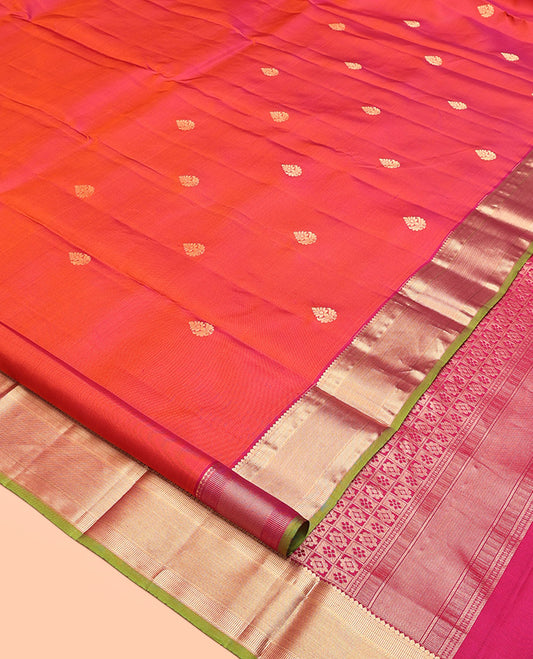 Orange Kanchipuram Silk Saree, Adorned with Zari Buttas, Contrast Thilakam Zari Border, Pallu of Butta Enclosed Checks, and a Contrast Blouse