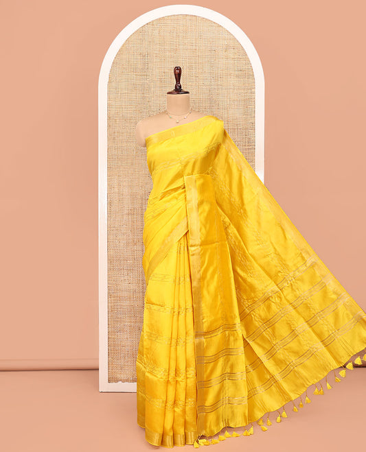 Yellow Banana Pith Saree, Sparsely Woven with Buttas and Stripes on Its Body, Subtly Zari Border, Pallu Steeped with Zari Stripes, and Paired with a Matching Blouse