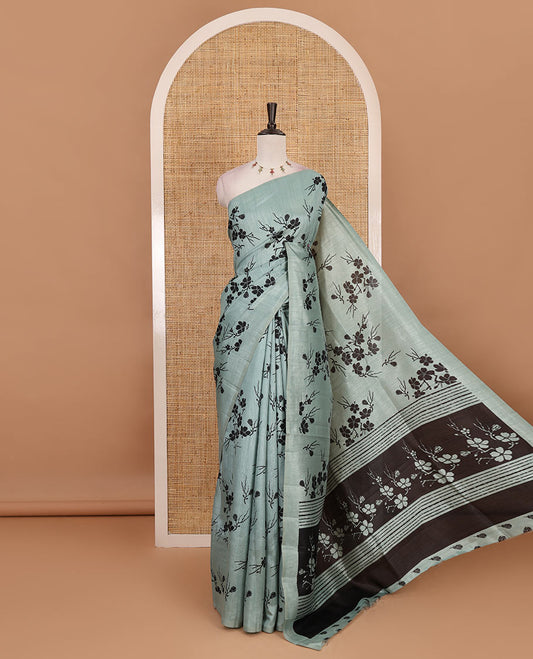 Borderless green five petal floral motifs printed semi tussar saree, self-pallu of  floral print, and printed blouse