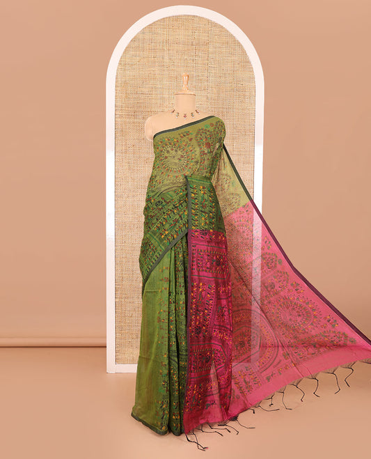 Borderless olive green and pink Warli village printed khadi mul cotton saree, contrast Warli motifs printed pallu, and a plain blouse