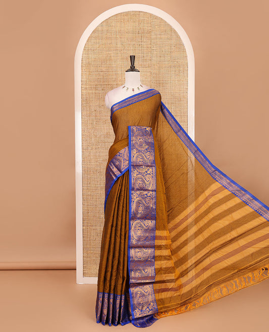 Brown plain design mercerised cotton saree, contrast traditional peacock enclosed manga border, striped pallu & matching blouse