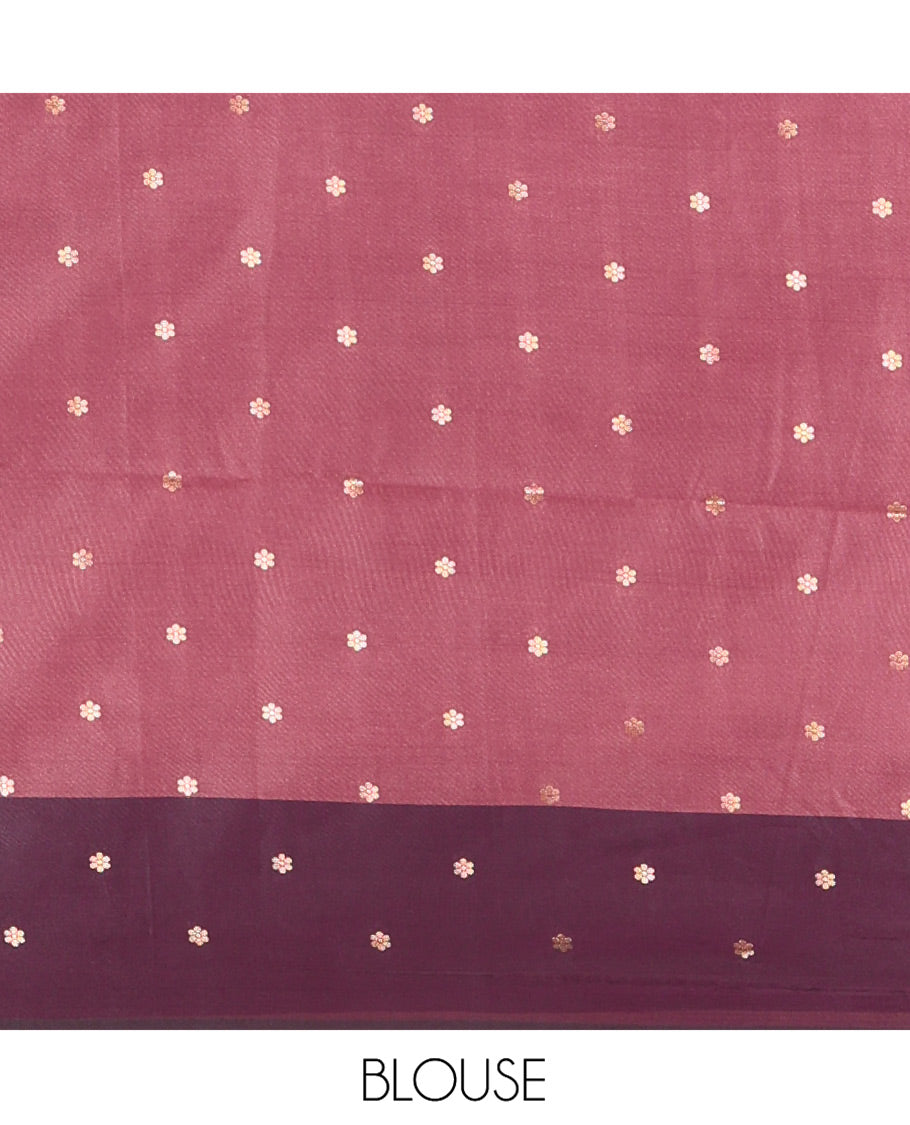 Pink Soft Silk Saree, Enriched With Zari Buttas All Over Its Body, Complemented by Captivating Contrast Border of Elephant Motifs, Grandly Decked Up Pallu, and Paired with a Contrast Blouse