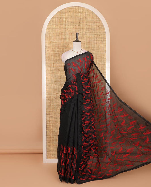 Black all-over feather motifs, red-color thread embroidered Kota chex saree, lace border, and plain black blouse