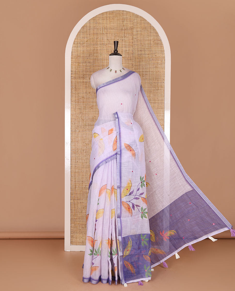 Lavender colorful floral vine printed with mirror embroidered linen saree, contrast zari piping border, and contrast printed blouse