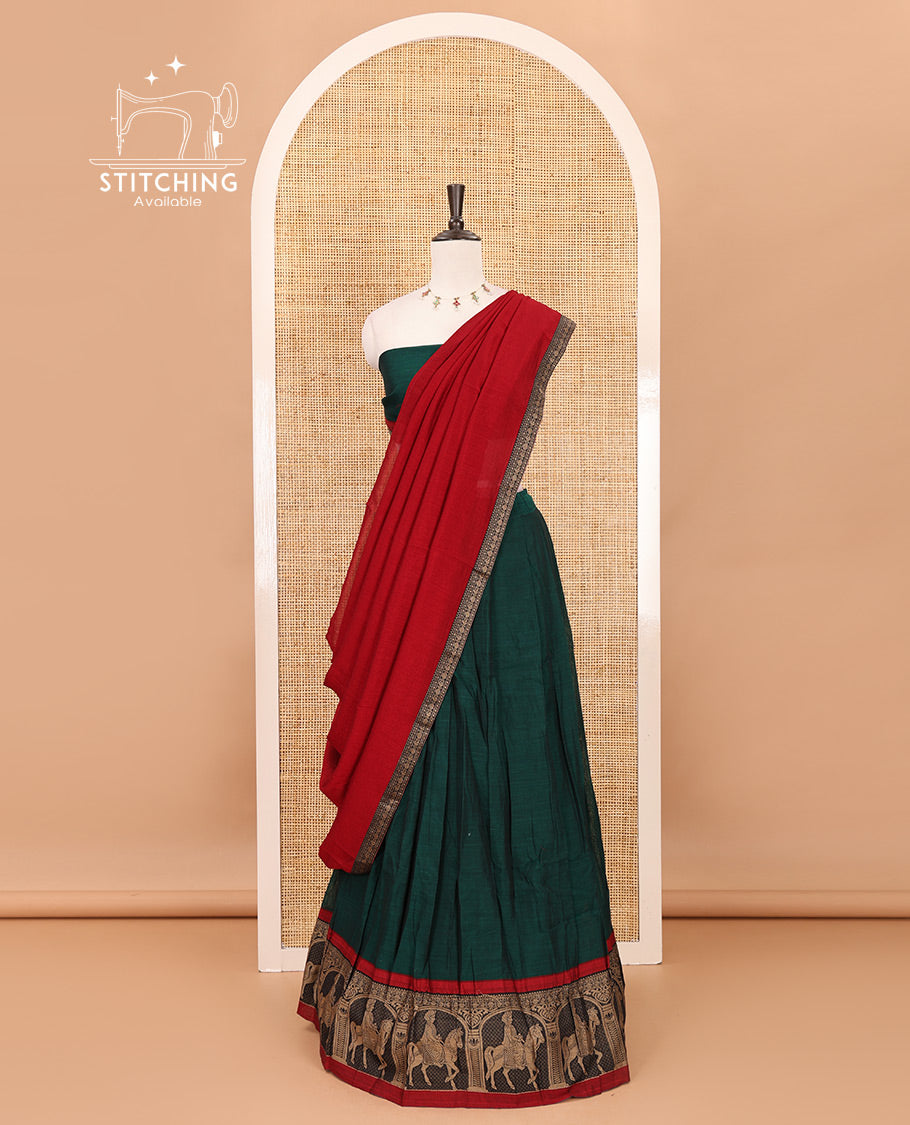 Green with maroon mercedised cotton half-saree, contrast elephant zari border skirt, matching blouse & one side border georgette dhavani