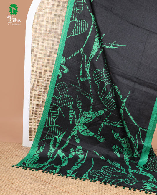 Black with green geomentrical design khadhi silk saree with contrast striped border & geomentrical print pallu along with printed blouse