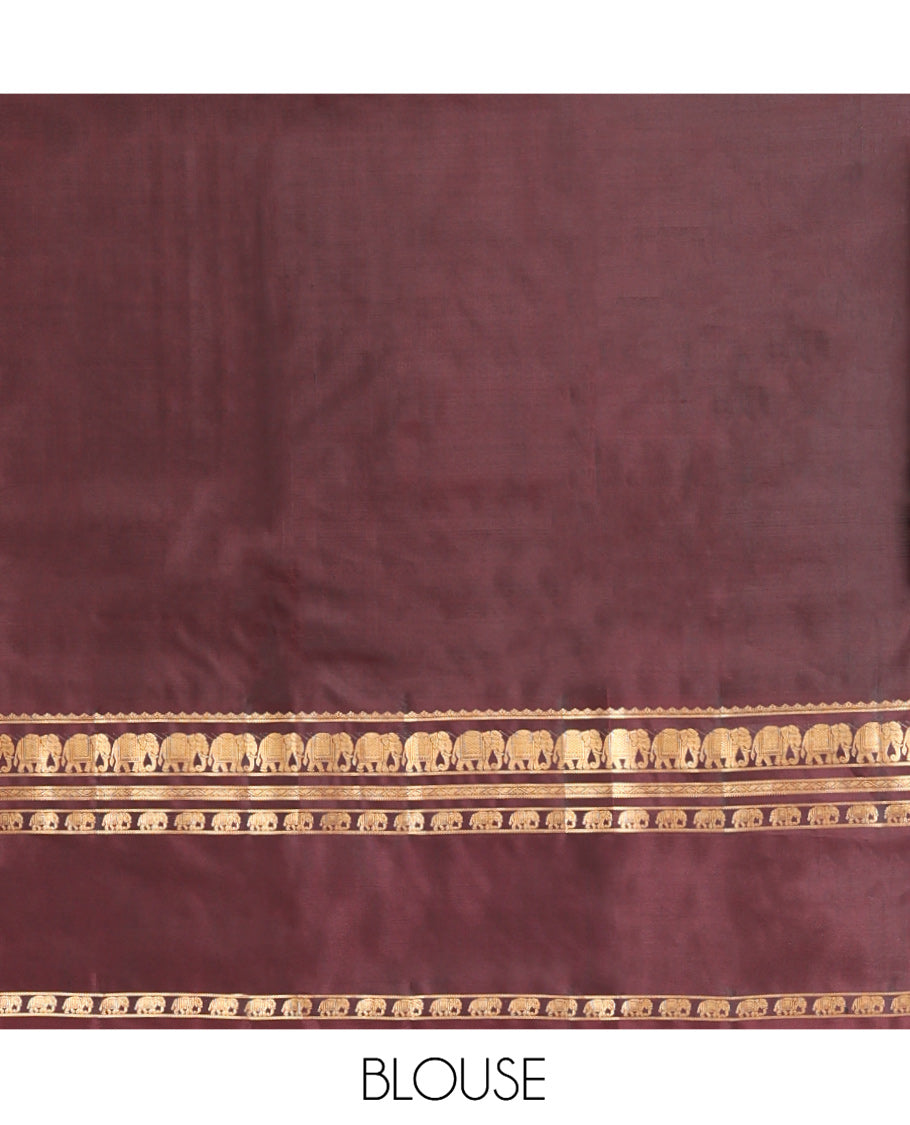 Green Vasundhara Silk Saree, Elevated with Zari Buttas All Over Its Body, Complemented by a Contrast Rettai Pettu Border of Yaanai Designs, Grand Jaal Pallu, and Paired with a Contrast Blouse