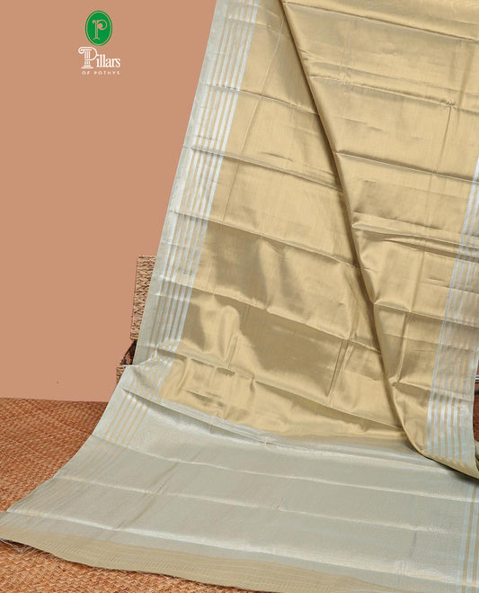 Light brown soft silk saree with contrast striped border & zari design pallu