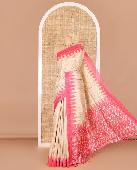 Chikku-pink plain Khicha katan silk saree, contrast pink temple border, ikkat printed pallu with tassels, and a contrast blouse