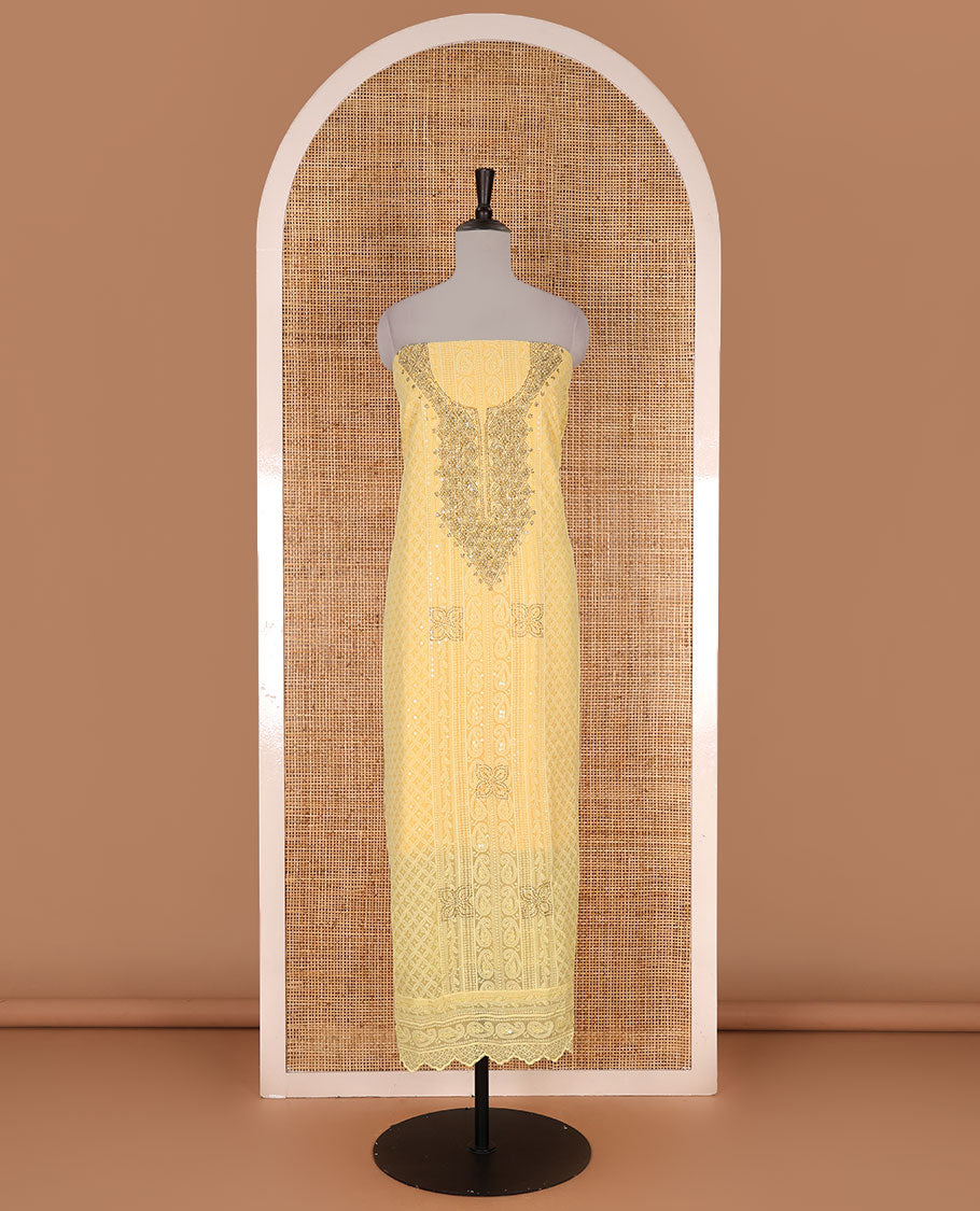 Yellow material churidar set, stone work with Schiffli style embroidered georgette top, American Crape bottom, and polka dotted printed mirror work dupatta